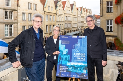 Erlebe am 24. Oktober eine emotionale Licht- und Klangreise auf dem Prinzipalmarkt in Münster. „Longing for Peace“ gedenkt dem 375. Jahrestag des Westfälischen Friedens.
