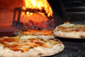 Erlebe, wo traditionelle italienische Pizza auf außergewöhnlichen Geschmack trifft und die beste Pizzeria Münsters Zuhause ist.