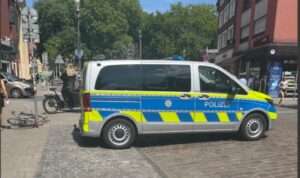 Polizei Münster Bulli parkt