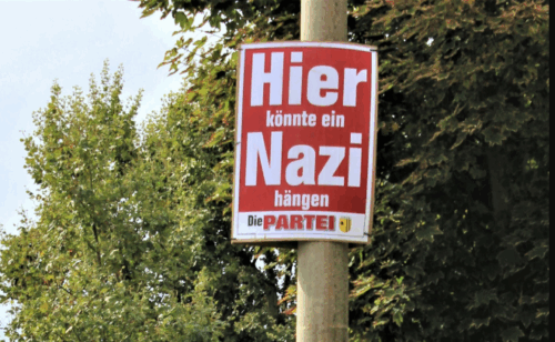 In Münster sorgt ein Satire-Plakat mit „Nazis töten.“ für Diskussionen. Was Gerichte entschieden haben, welche Regeln in Münster gelten und wann gewählt wird