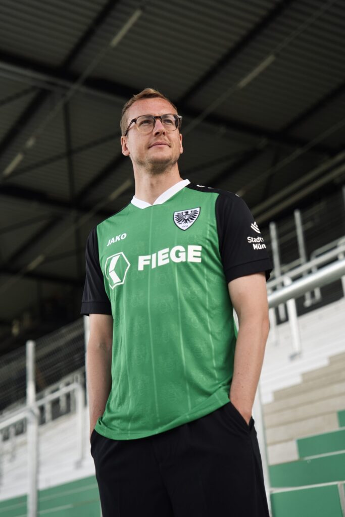 Preußen Münster zeigt das Heimtrikot 2026/27 mit Stadtwappen, Streifendesign und Verkaufsstart für Fans.